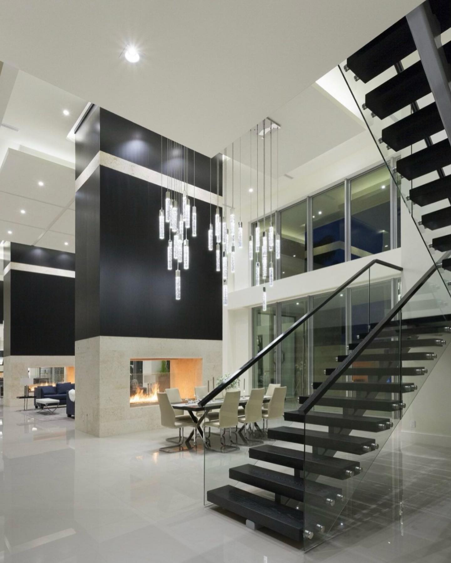 Custom glass railing system with black metal framing