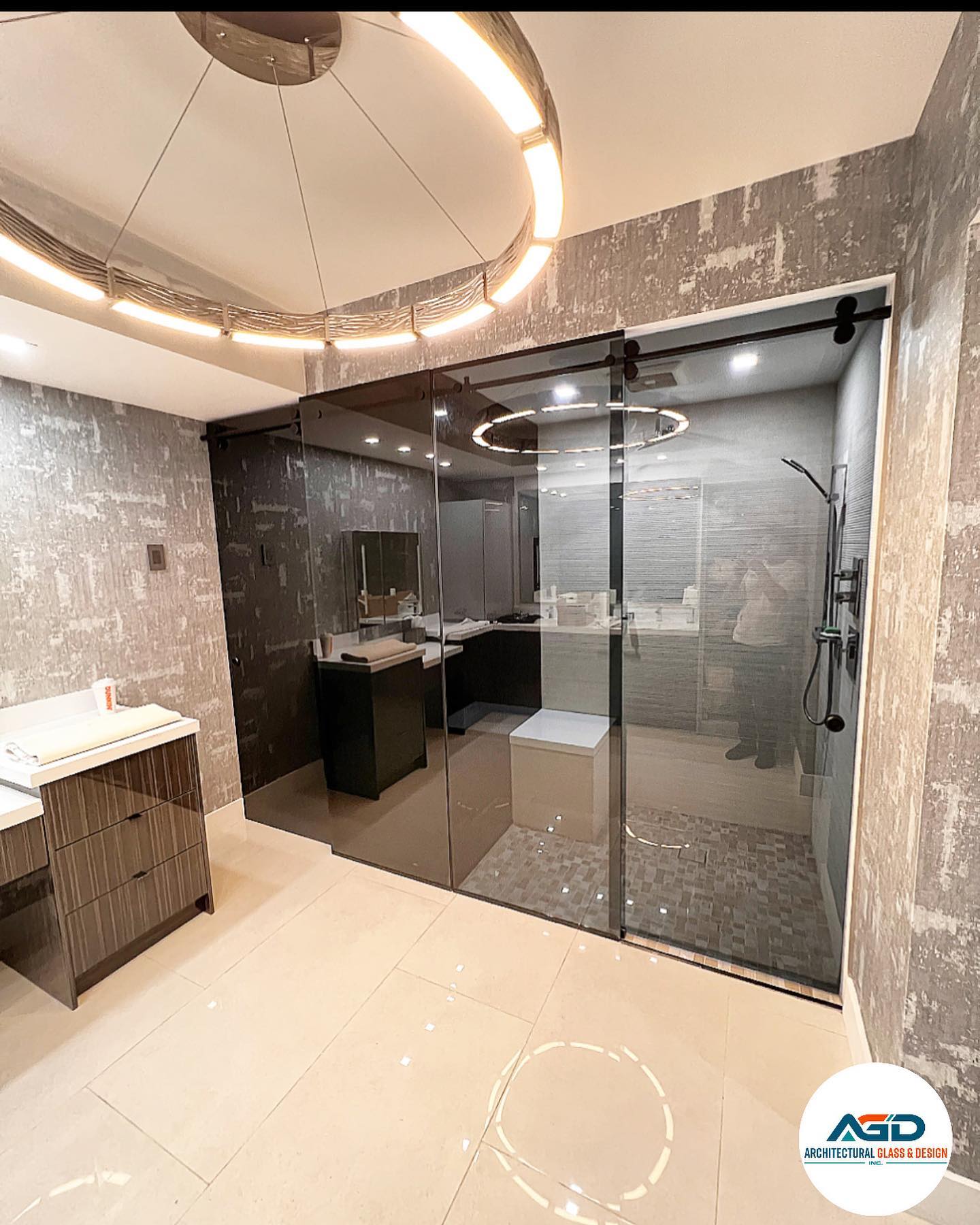 Custom frameless glass shower enclosure by Architectural Glass and Design