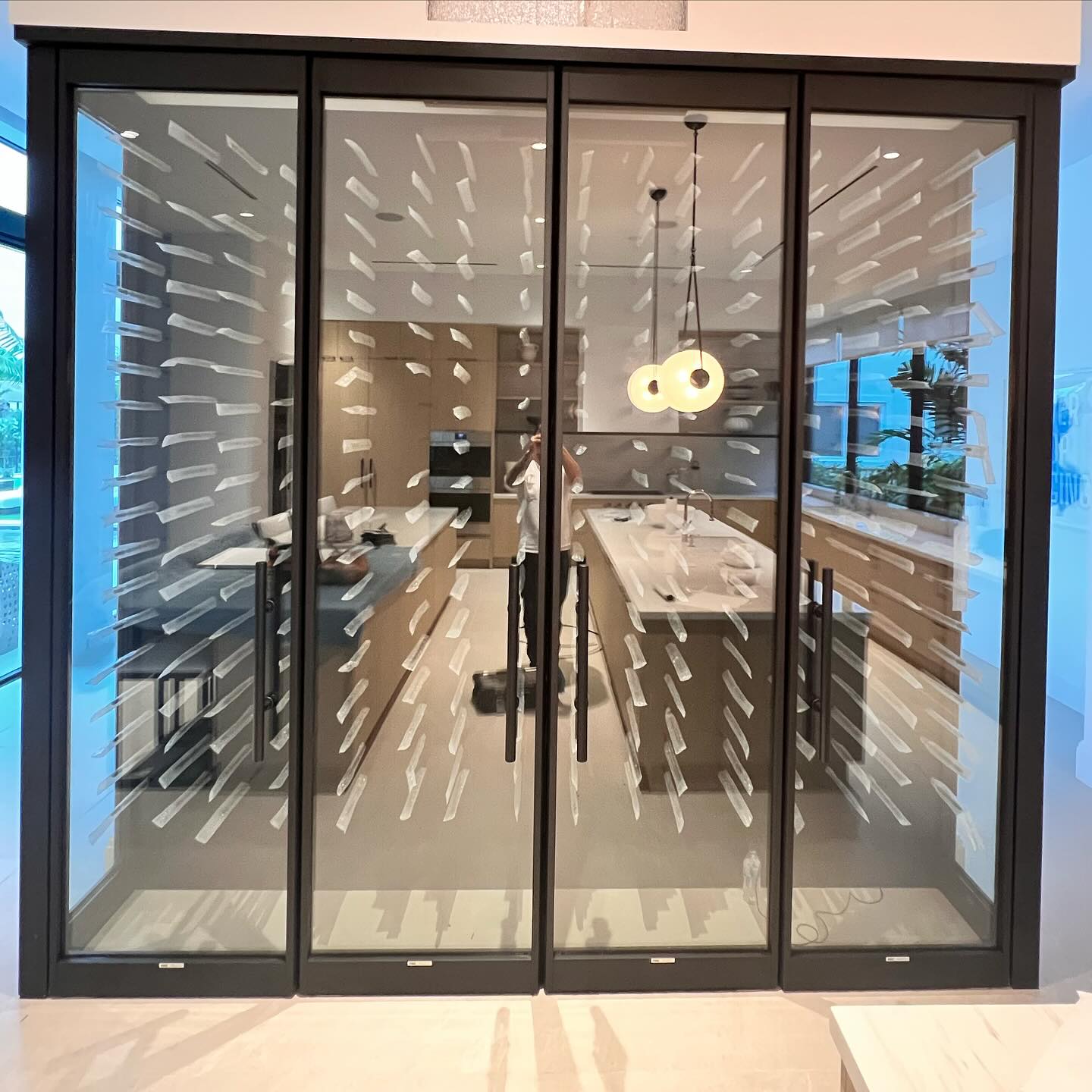 Custom glass enclosed wine room by Architectural Glass and Design